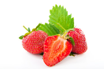 fresh cut strawberry with leaf isolated on white