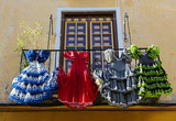Fototapeta Nowy Jork - Traditional flamenco dresses at a house in Malaga, Spain
