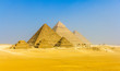 View of pyramids from the Giza Plateau: three Queens' Pyramids,