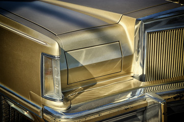 Wall Mural - Detail on the headlight of a vintage car. retro style photo