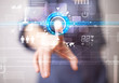 © ra2 studio - Young business woman touching future web technology buttons and