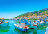 Fototapeta  - fishing boats at the main port of Kalymnos island in Greece