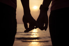 Love Couple Holding Hands Fingers At Sunset On The Beach, Valent