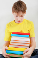 Wall Mural - Sad Teenager with a Books