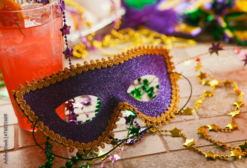 Mardi Gras: Party Mask Sits Against Tropical Hurricane Cocktail Poster