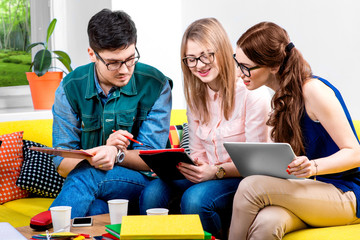 Students working on the couch