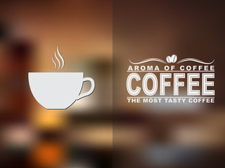 Fototapete - Coffee cup icon and text design with a blurred background.