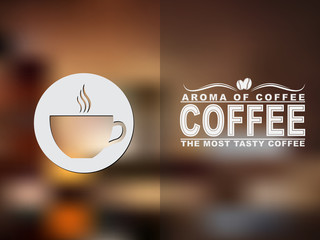 Fototapete - Coffee cup icon and text design with a blurred background.