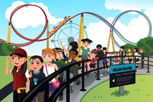 Children Waiting In Line For A Roller Coaster Ride