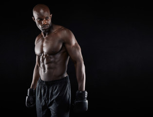 Wall Mural - Shirtless boxer looking away