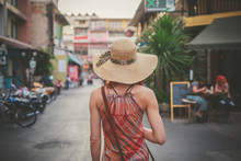 Young Woman Walking On Th Estreet In Asian Country