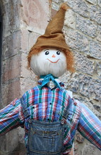A Funny And Smiling Scarecrow