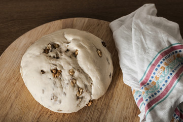 Homemade raw bread dough with  walnuts