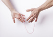 © patronestaff - Woman and man with red string of fate