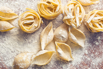 raw pasta and flour