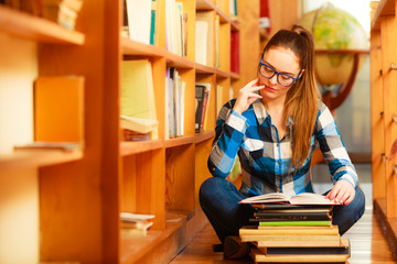 Wall Mural - Woman student in college library