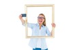 © WavebreakMediaMicro - Blonde woman taking a selfie through a frame