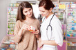 © DC Studio - Client and doctor inside pharmacy
