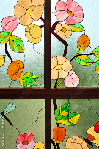 Fototapeta do kuchni Bright floral pattern on a stained glass window