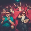 © Nejron Photo - Group of people in 3D glasses watching movie in cinema