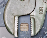 Fototapeta Paryż - credit card with tool, credit repair or credit fix concept