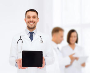 Sticker - smiling male doctor with tablet pc