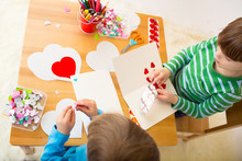 Kids Engaged In Valentine's Day Arts With Hearts