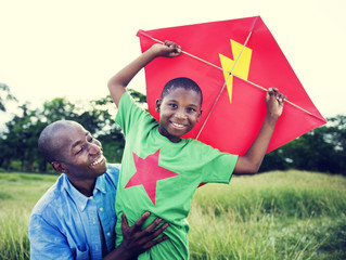 Wall Mural - African Family Happiness Holiday Vacation Activity Concept