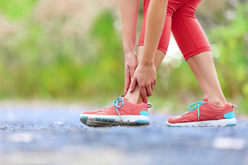 Wall Mural - Twisted broken ankle - running sport injury