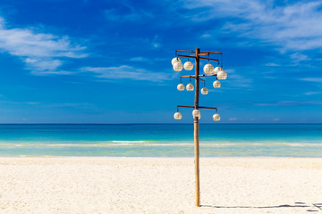 Tropical beach and beautiful sea. Blue sky with clouds in the ba