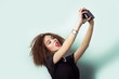 © nyushashypulia27 - young girl hipster takes photos shoots selfe taking  on camera