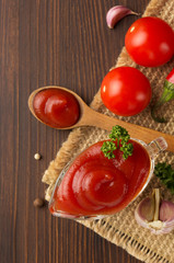 Wall Mural - tomato sauce on wood