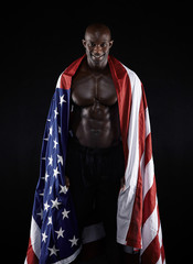 Wall Mural - Muscular man with American flag