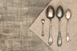 Spoons on textured background