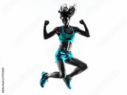 Obraz w ramie woman fitness jumping exercises silhouette