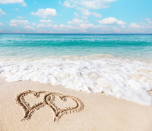Hearts Drawn On The Beach Sand.