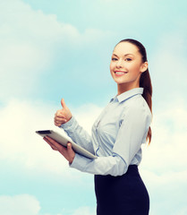 Sticker - smiling woman looking at tablet pc computer