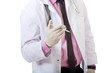 © Piotr Marcinski - Male doctor holding a syringe.