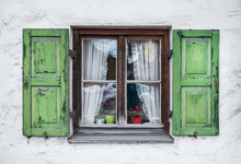 Authentic Window With Green Wooden Shuttters In A Small Town Of