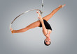 Plastic beautiful girl gymnast on acrobatic circus ring in flesh