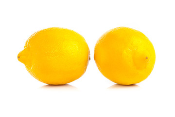 Yellow ripe lemon isolated on a white