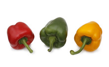 Composition With Three Peppers On White Background