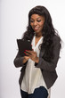 © blvdone - African American black woman using tablet pc computer