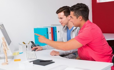 Wall Mural - Students working together on computer