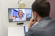 © ldprod - Businessman on video conference with her colleague in office job