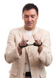 © spaxiax - Worried caucasian business man in handcuffs