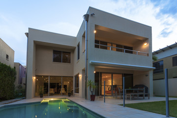 Modern home exterior at dusk