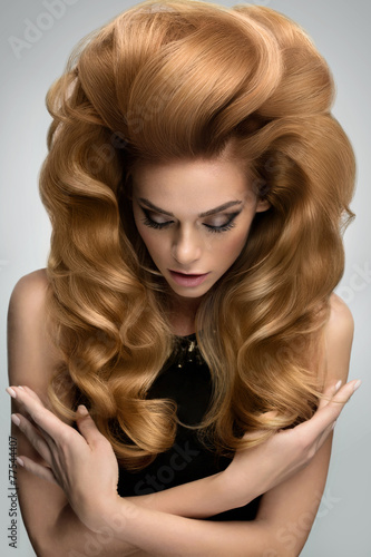 Naklejka na kafelki Hair volume. Portrait of beautiful Blonde with Long Wavy Hair.