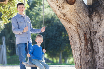 Wall Mural - family at swings