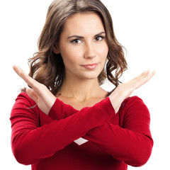 Serious woman with stop gesture, on white